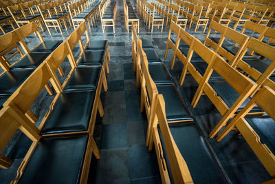 High angle view of empty chairs against church