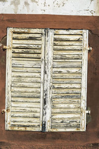 Closed wooden door of building