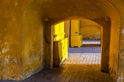 Yellow archway on sunny day