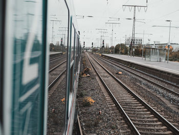 Train on railroad station platform against sky