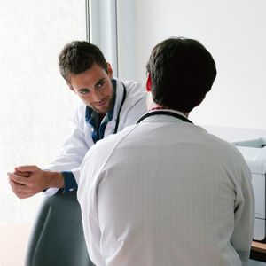 Doctors discussing in hospital