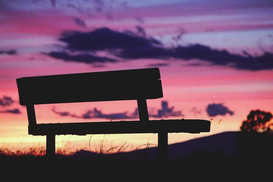 sunset, silhouette, sky, tranquility, tranquil scene, scenics, cloud - sky, landscape, nature, beauty in nature, orange color, cloud, field, idyllic, dusk, tree, dramatic sky, bench, outdoors, no people