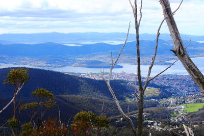 Scenic view of landscape and mountains against sky