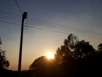 Low angle view of electricity pylon