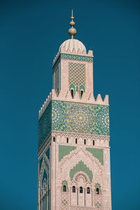 Low angle view of building against blue sky