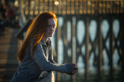 Side view of young woman