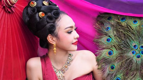 Close-up of beautiful woman wearing traditional clothing and jewelries