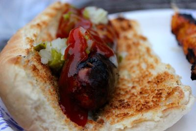 Close-up of hot dog in plate