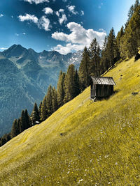 Scenic view of landscape and mountains against sky
