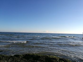 Scenic view of sea against clear sky