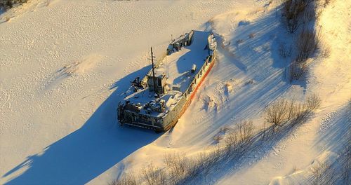 High angle view of snow covered land