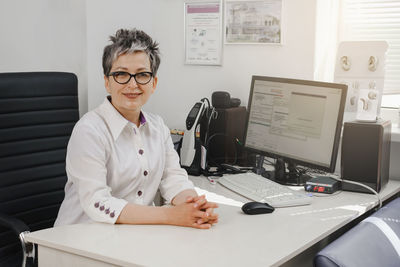 Portrait of doctor working at clinic