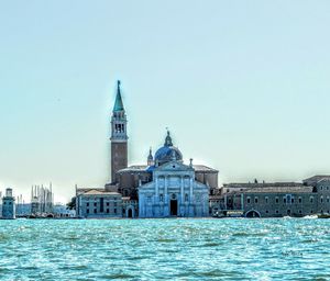 View of church against clear blue sky