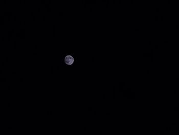 Low angle view of moon in sky