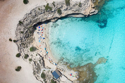 High angle view of woman swimming in sea