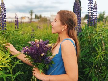 Woman picking lavenders