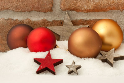 High angle view of apples on snow