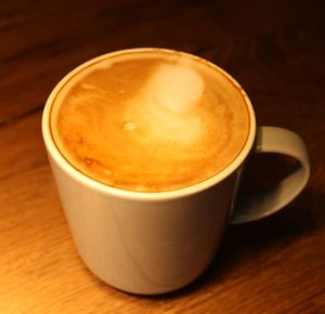 High angle view of cappuccino on table