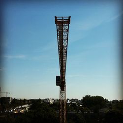 Low angle view of tower against clear blue sky