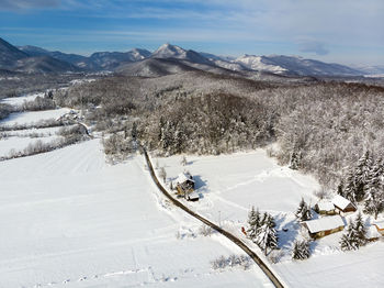 Winter in wooden village in lika, croatia