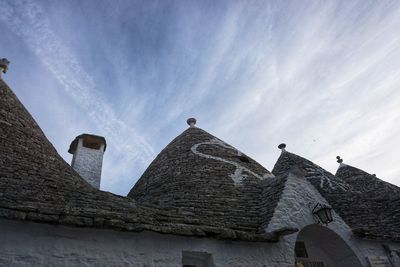 Low angle view of old building against sky