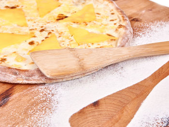 High angle view of bread on cutting board
