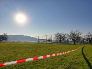 Scenic view of field against clear sky