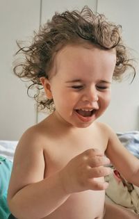 Portrait of cute baby girl at home