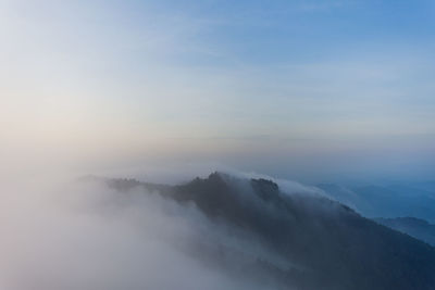 Scenic view of mountains against sky during sunset