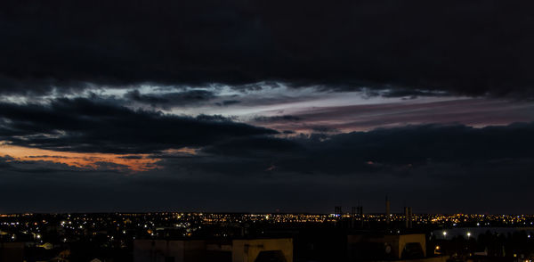 Illuminated cityscape at night