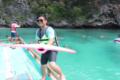 People enjoying at sea