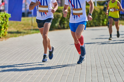 Low section of people running