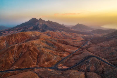 Aerial view of landscape during sunset