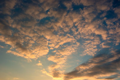 Low angle view of dramatic sky during sunset