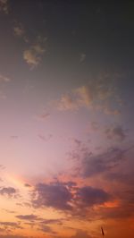 Low angle view of dramatic sky during sunset