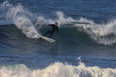 Man surfing in sea