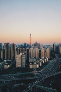 Aerial view of city at sunset