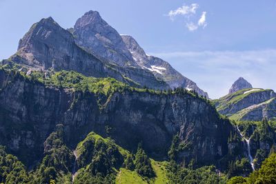 Scenic view of rocky mountains against sky