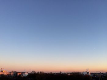 View of cityscape against clear sky