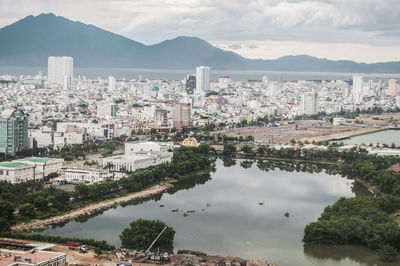 High angle view of city and buildings against sky