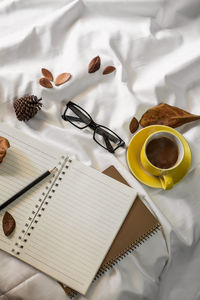 High angle view of coffee cup on table