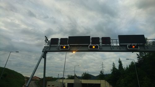 View of bridge against cloudy sky