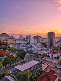 High angle view of buildings against sky during sunset