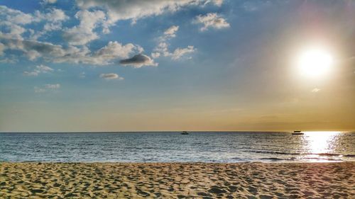 Scenic view of sea at sunset