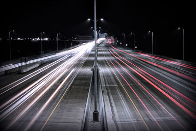 High angle view of light trails on road at night