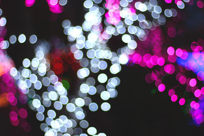 Defocused image of illuminated christmas lights