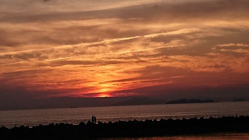 Scenic view of beach during sunset