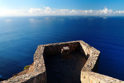 High angle view of observation point over sea against sky