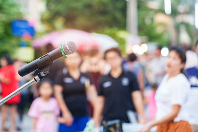 Close-up of microphone in city during event