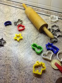 Colorful objects on tiled floor